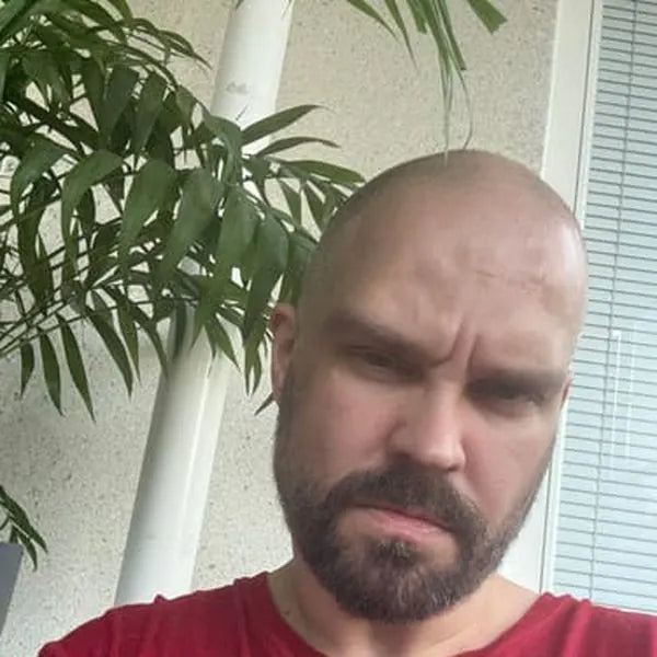Aleksei A. after: dark beard