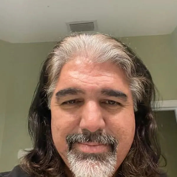Pedro A. before: salt-and-pepper long hair and a white goatee