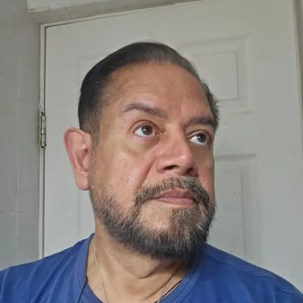 Andres L. after: dark hair and beard